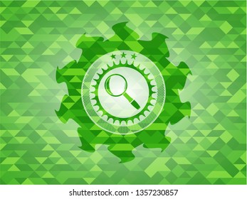 magnifying glass icon inside green emblem with mosaic background