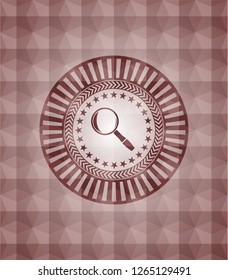 magnifying glass icon inside red seamless emblem or badge with geometric pattern background.