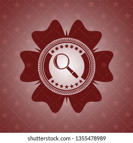 magnifying glass icon inside retro red emblem
