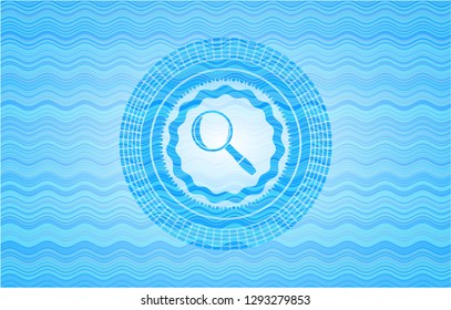 magnifying glass icon inside sky blue water wave badge.