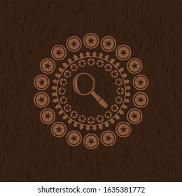 magnifying glass icon inside vintage wooden emblem