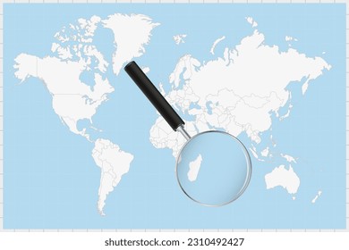 Magnifying glass showing a map of Mauritius on a world map. Mauritius flag and map enlarge in lens. Vector Illustration.