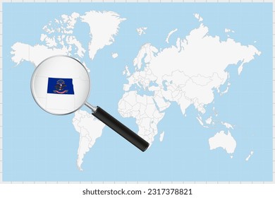 Magnifying glass showing a map of North Dakota on a world map. North Dakota flag and map enlarge in lens. Vector Illustration.