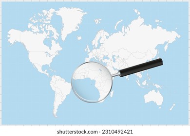 Magnifying glass showing a map of Sao Tome and Principe on a world map. Sao Tome and Principe flag and map enlarge in lens. Vector Illustration.