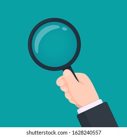 Magnifying glass vector The hand of a business man with a magnifying glass Inspection concept.