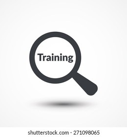 Magnifying glass with word Training on white background.