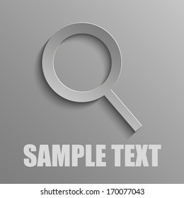 Magnifying loupe on a gray background