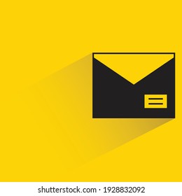 mail with shadow on yellow background