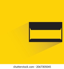 mail with shadow on yellow background