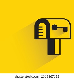 mailbox with shadow on yellow background