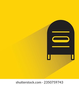 mailbox with shadow on yellow background
