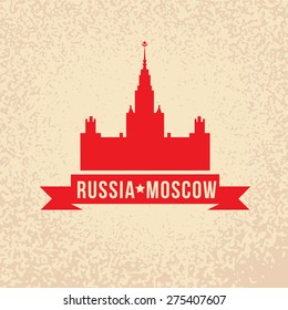 The main building of Moscow State University - the symbol of Moscow, . Vintage stamp with red ribbon.