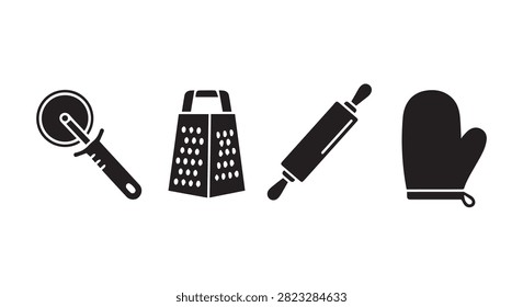 Main subject focus on kitchen utensils including grater rollingpin and ovenmitt for a simple still life