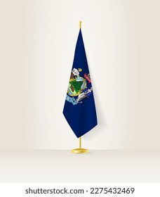 Maine flag on a flag stand. Vector illustration.