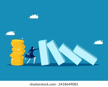 Maintain stable finances. Confident businesswoman stops falling dominoes to protect pile of money