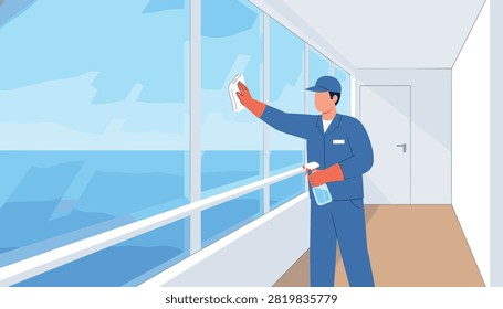 Maintenance worker cleaning large glass windows inside a modern building overlooking the ocean.