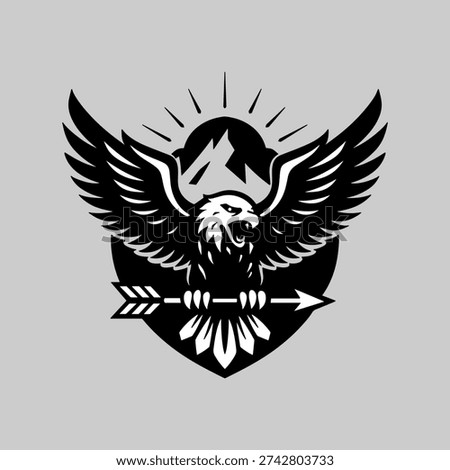 Majestic eagle soaring with arrow and mountains in circular sun rays emblem