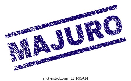 MAJURO stamp seal watermark with scratced style. Blue vector rubber print of MAJURO text with unclean texture. Text title is placed between parallel lines.