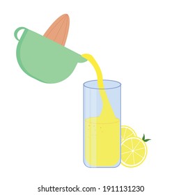 Make Lemonade. Lemon Juice is poured into the glass from thegreen  lemon squeezer(citrus juicer). Lemons next to the glass.