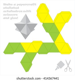 Make a paper craft stellated octahedron with scissors and glue!