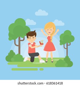 Make a proposal. Man gives a woman his heart and ring.
