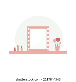Make up table with mirror, brushes and lipsticks.
