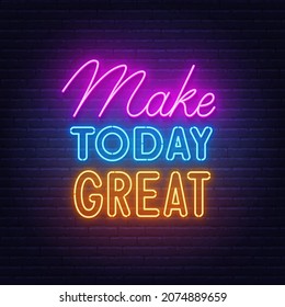 Make Today Great neon lettering on brick wall background.