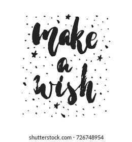 Make a wish - hand drawn Christmas and New Year winter holidays lettering quote isolated on the white background. Fun brush ink inscription for photo overlays, greeting card or poster design