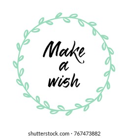 Make a wish - hand drawn lettering by ruling pen for Christmas card with decoration of wreath. Vector typography design isolated on white background.