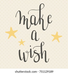 "Make a wish" hand lettering with stars. Hand drawn vector art. 
