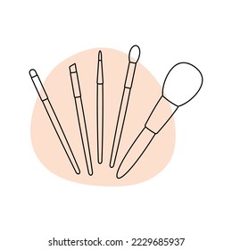 Makeup brushes in the style of line art with colored spots. vector illustration