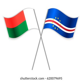 Malagasy and Cabo Verdean crossed flags. Madagascar combined with Cabo Verde isolated on white. Language learning, international business or travel concept.