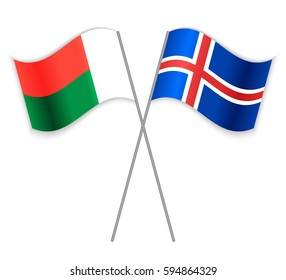 Malagasy and Icelandic crossed flags. Madagascar combined with Iceland isolated on white. Language learning, international business or travel concept.