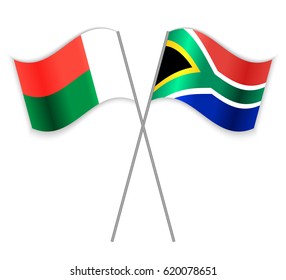 Malagasy and South African crossed flags. Madagascar combined with South Africa isolated on white. Language learning, international business or travel concept.