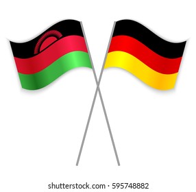 Malawian and German crossed flags. Malawi combined with Germany isolated on white. Language learning, international business or travel concept.