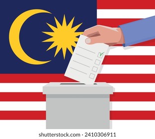 Malaysia election concept. Hand puts vote bulletin into vote box.