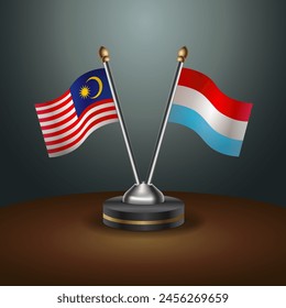 Malaysia and Luxembourg table flags relation with gradient backgrund