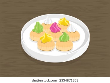 Malaysia and Singapore childhood traditional snacks. Colorful Iced Gem a snack sweet biscuits on white plate on dark wood table