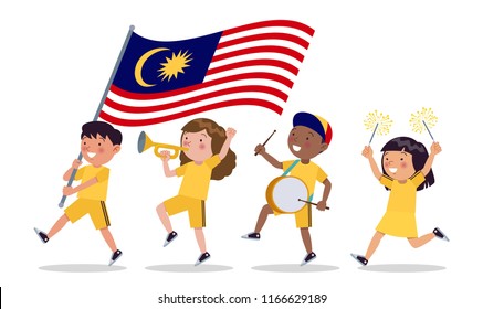 Malaysian children of various tribes are parading commemorating and celebrating the Independence day of Malaysia