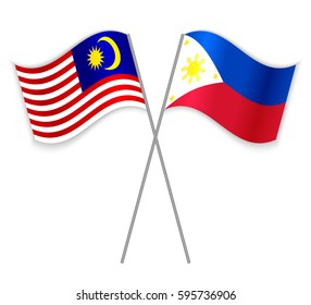 Malaysian and Filipino crossed flags. Malaysia combined with Philippines isolated on white. Language learning, international business or travel concept.