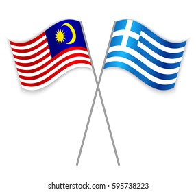 Malaysian and Greek crossed flags. Malaysia combined with Greece isolated on white. Language learning, international business or travel concept.