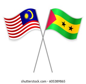 Malaysian and Sao Tomean crossed flags. Malaysia combined with Sao Tome and Principe isolated on white. Language learning, international business or travel concept.