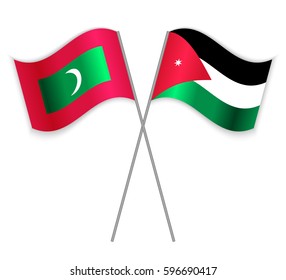 Maldivian and Jordanian crossed flags. Maldives combined with Jordan isolated on white. Language learning, international business or travel concept.