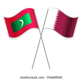 Maldivian and Qatari crossed flags. Maldives combined with Qatar isolated on white. Language learning, international business or travel concept.