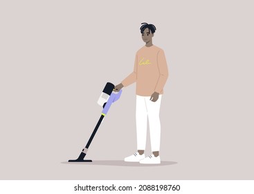 A male African character cleaning with a cordless vacuum cleaner, household chores