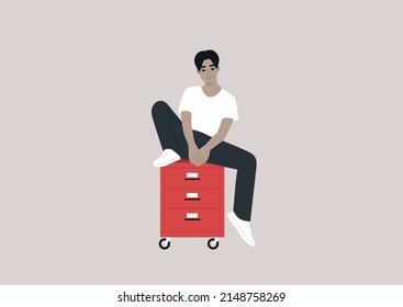 A male Asian character sitting on an office file cabinet, millennials at work, a daily routine