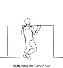 male athlete pulls himself up on the horizontal bar - one line drawing vector. concept of a man exercising, builds up the muscles of the arms
