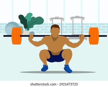Male athletes play weightlifting sports at the gym.