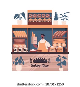 male baker holding bag with baguettes man in uniform selling fresh bakery products in baking shop portrait vector illustration