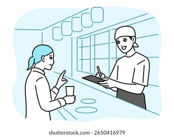 A male bar attendant taking orders at the counter